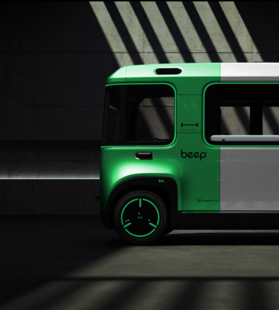 Front Parat of the mover in a green and silver colour design with their partner beep